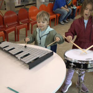 Kids playing symphony instruments
