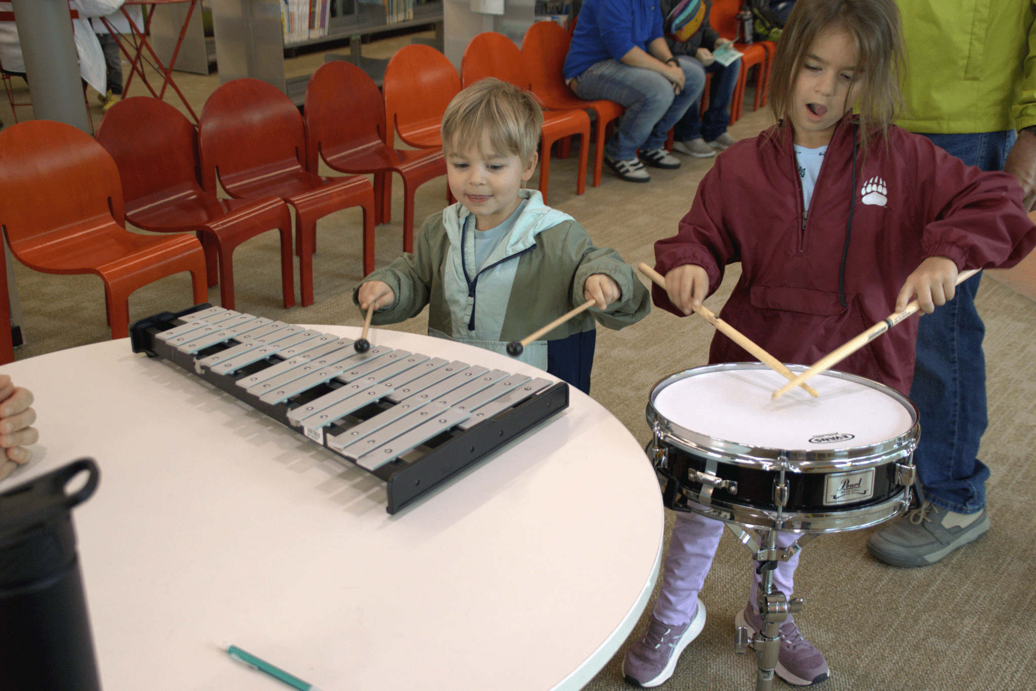 Kids playing symphony instruments